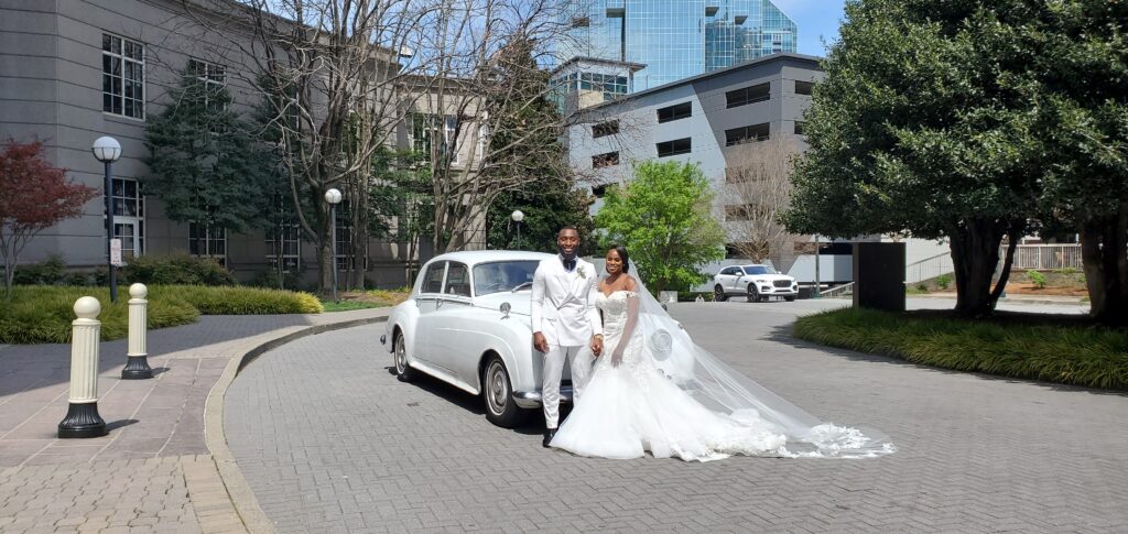 Vintage Classic Car Rolls Royce Wedding Getaway.jpg